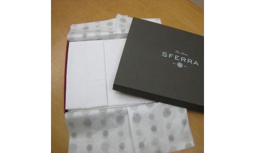 Sferra Fine Linens packaging features Mohawk Superfine Ultrawhite Eggshell 