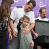 Kaka, Orlando City Soccer team captain, helping Paulo put on his Limbitless Arm which was 3D printed on a Stratasys Dimension Elite 3D Printer. Photo courtesy of Orlando City Soccer