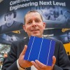 Lasting reductions in production costs: At the LOPEC Armin Senne, flexo business manager at ContiTech, shows prototypes of printed solar cells.  Photo: ContiTech