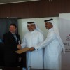 Callan Carpenter (VP, Global Services, Autodesk), Saad Al Muhannadi (Qatar Rail CEO) and Nasser Rashid E R Al-Kuwari (Head of Engineering Information Section at Ashghal) at the signing ceremony in Doha (Photo: Business Wire)  